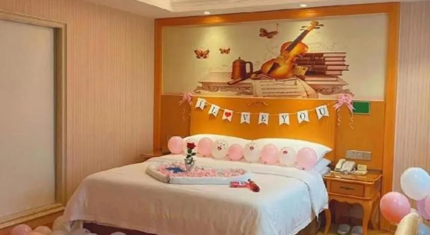 Bed in Vienna Hotel Guangxi Beiliu Passenger Station