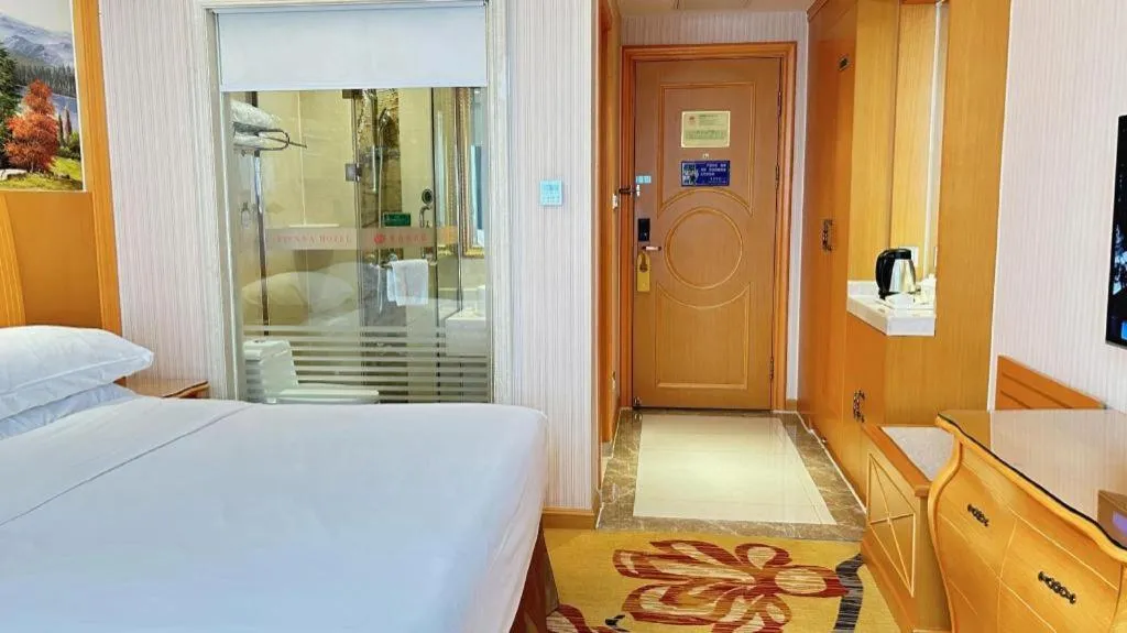 Bed in Vienna Hotel Guangxi Beiliu Passenger Station