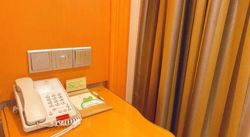 Bed in Vienna Hotel Guangxi Beiliu Passenger Station