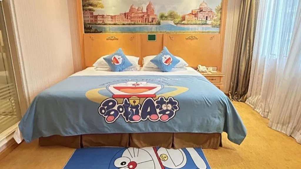 Bed in Vienna Hotel Guangxi Beiliu Passenger Station