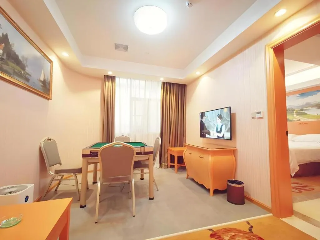 Bed in Vienna Hotel Guangxi Beiliu Passenger Station