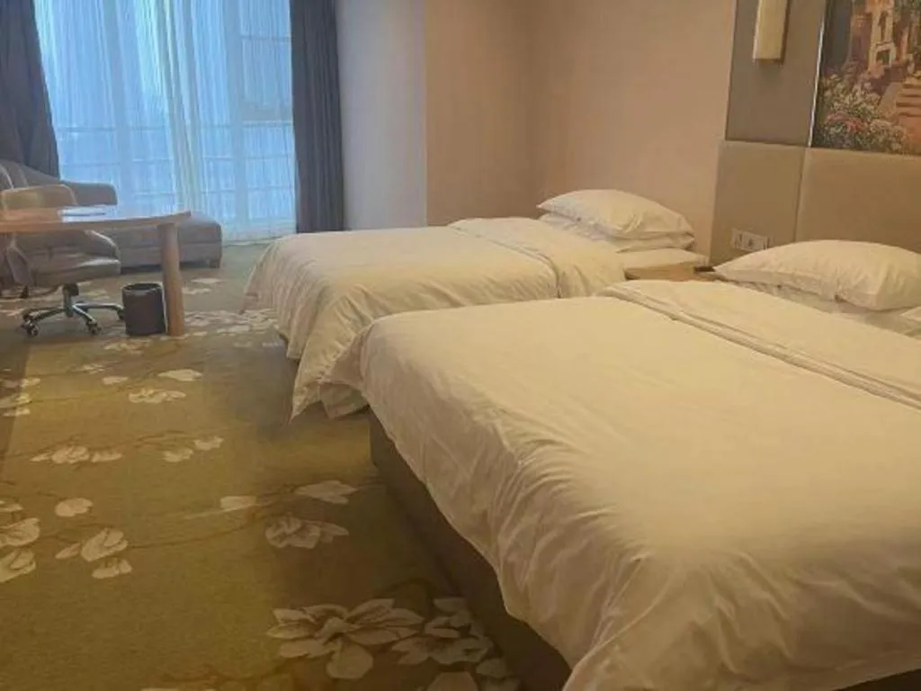 Bed in Vienna Hotel Wuhan Wenhua Avenue Jiangxia Keting Metro Station
