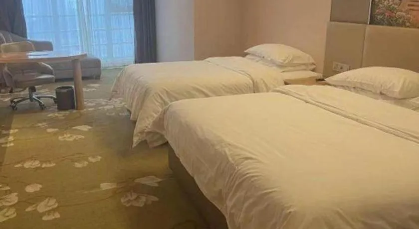 Bed in Vienna Hotel Wuhan Wenhua Avenue Jiangxia Keting Metro Station