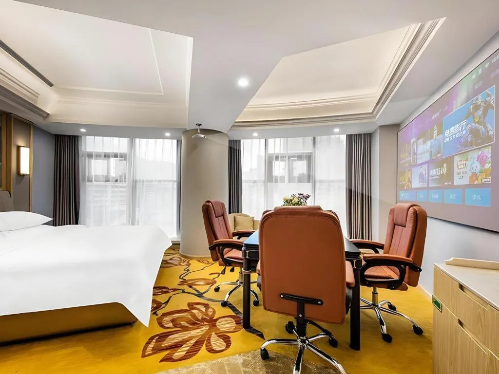 Bed in Vienna Hotel Zhejiang Lishui Qingtian Post Building