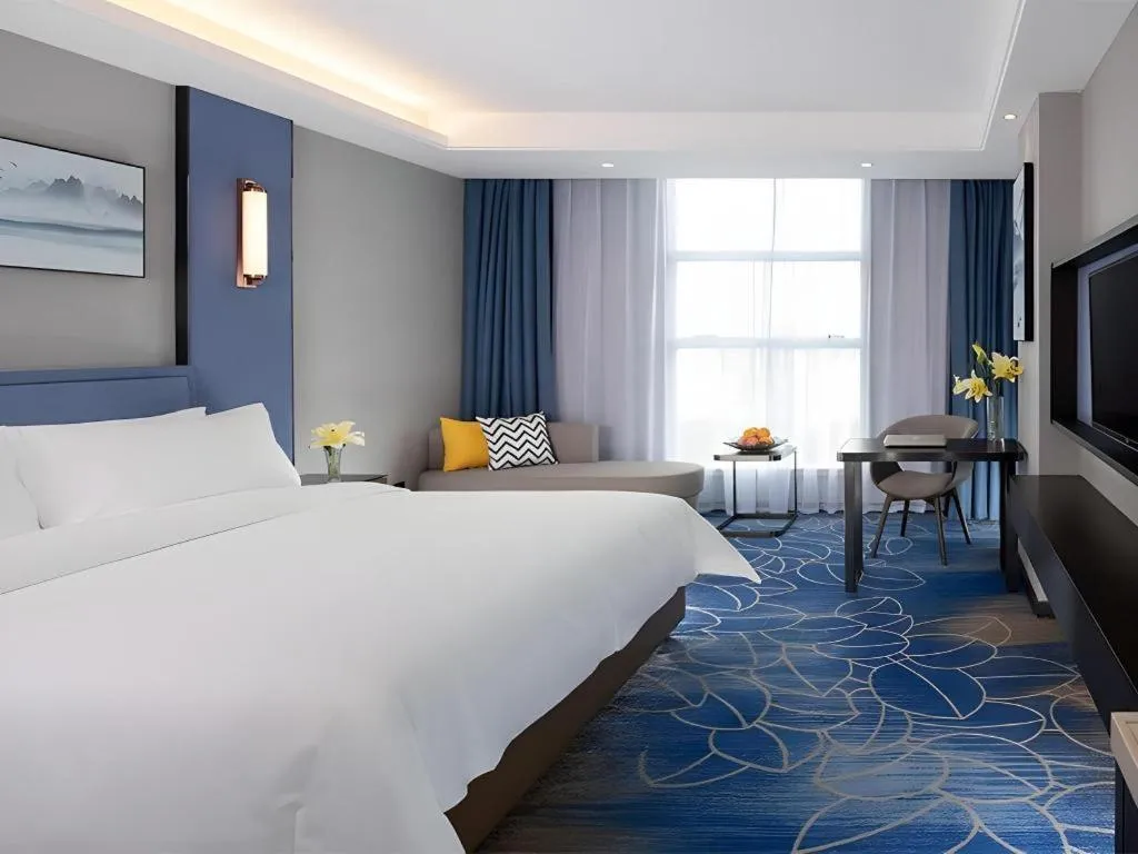 Bed in Vienna Hotel Guangdong Foshan Yihuanlishui