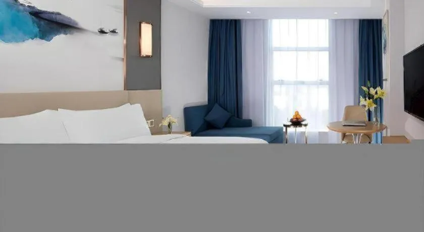 Bed in Vienna Hotel Guangdong Foshan Yihuanlishui