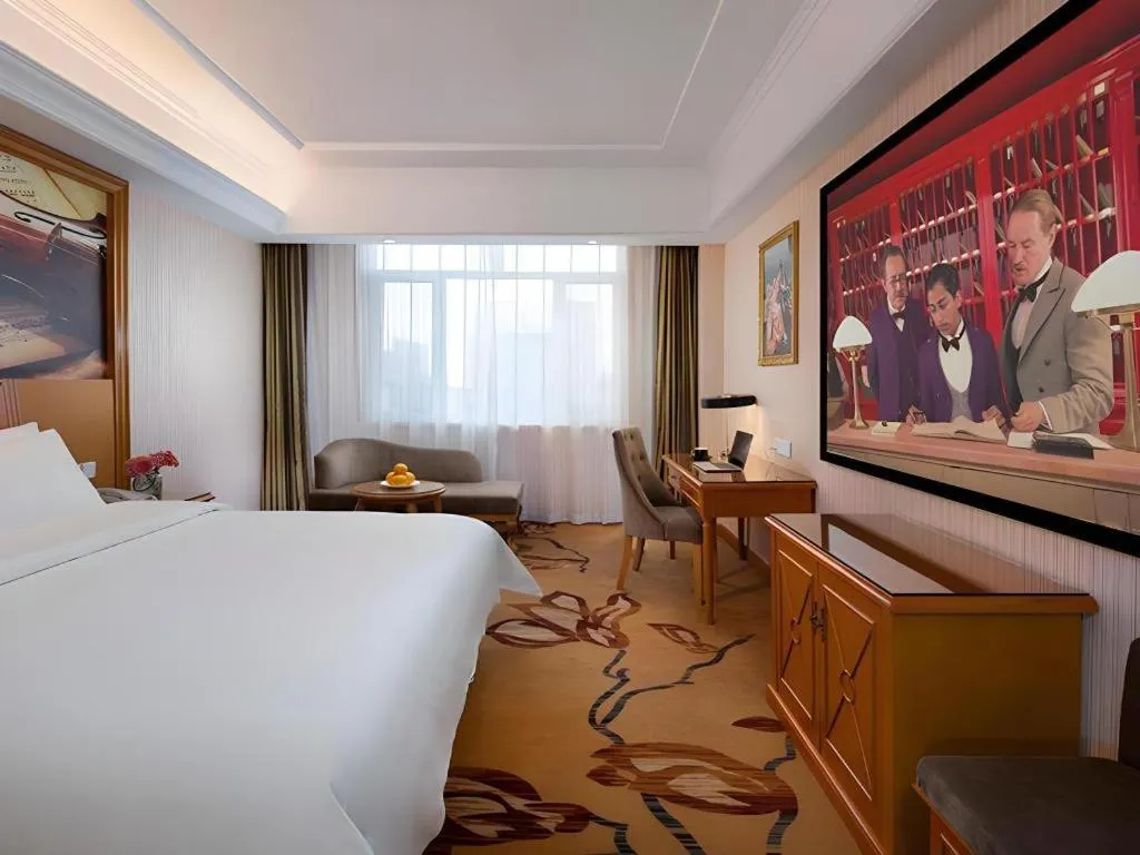 Bed in Vienna Hotel Shanxi Datong High-Speed Railway Station Wanda Plaza