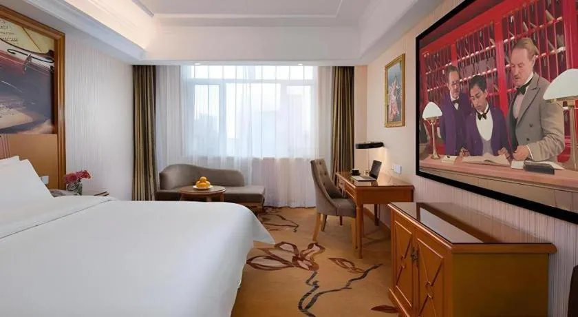 Bed in Vienna Hotel Shanxi Datong High-Speed Railway Station Wanda Plaza