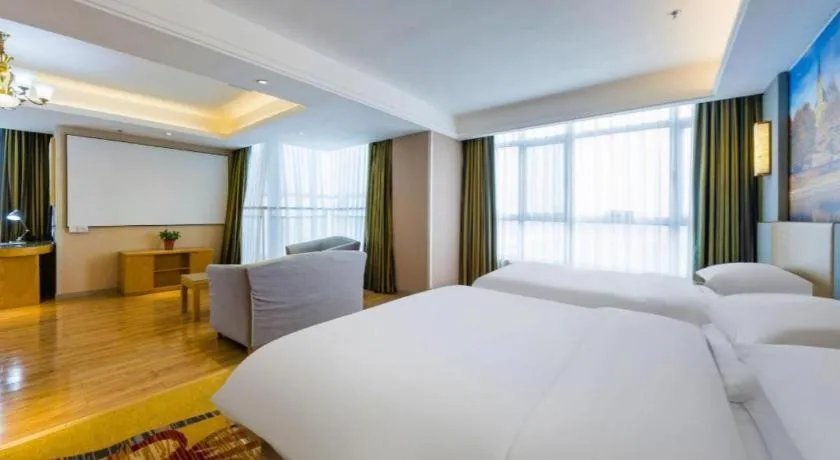 Bed in Vienna Hotel Shandong Qingzhou Ancient City
