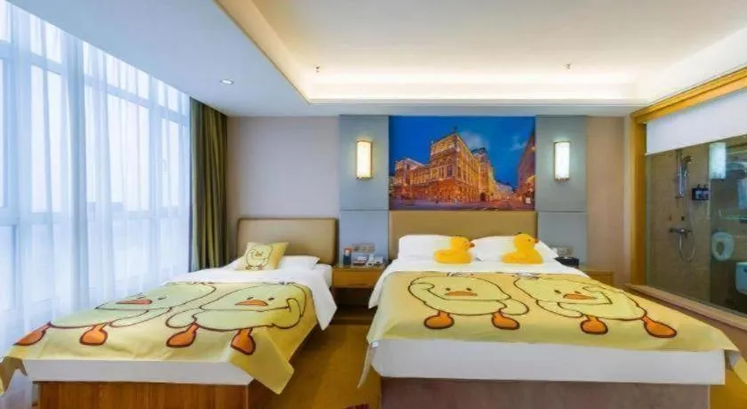 Bed in Vienna Hotel Shandong Qingzhou Ancient City