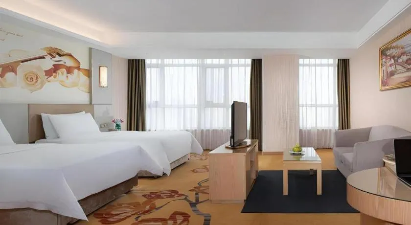 Bed in Vienna Hotel Shandong Qingzhou Ancient City