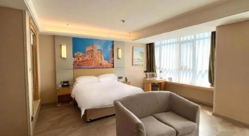 Bed in Vienna Hotel Shandong Qingzhou Ancient City