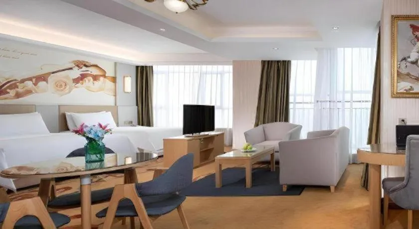 Bed in Vienna Hotel Shandong Qingzhou Ancient City