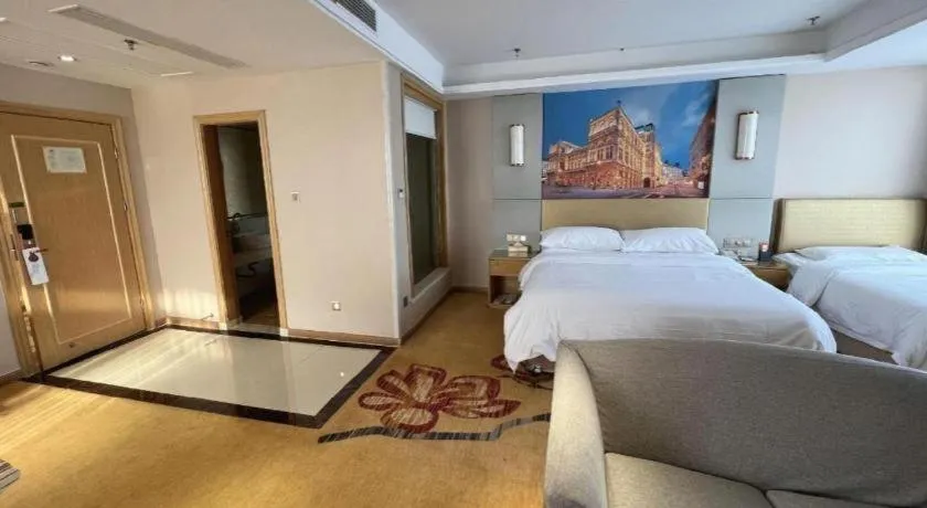 Bed in Vienna Hotel Shandong Qingzhou Ancient City