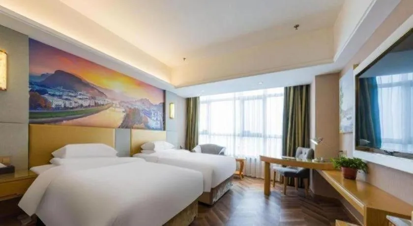 Bed in Vienna Hotel Shandong Qingzhou Ancient City