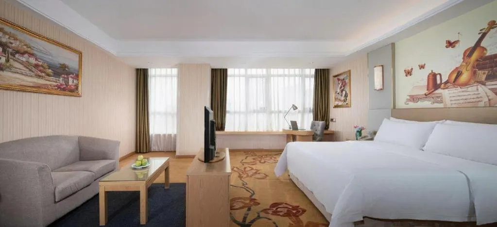 Bed in Vienna Hotel Shandong Qingzhou Ancient City