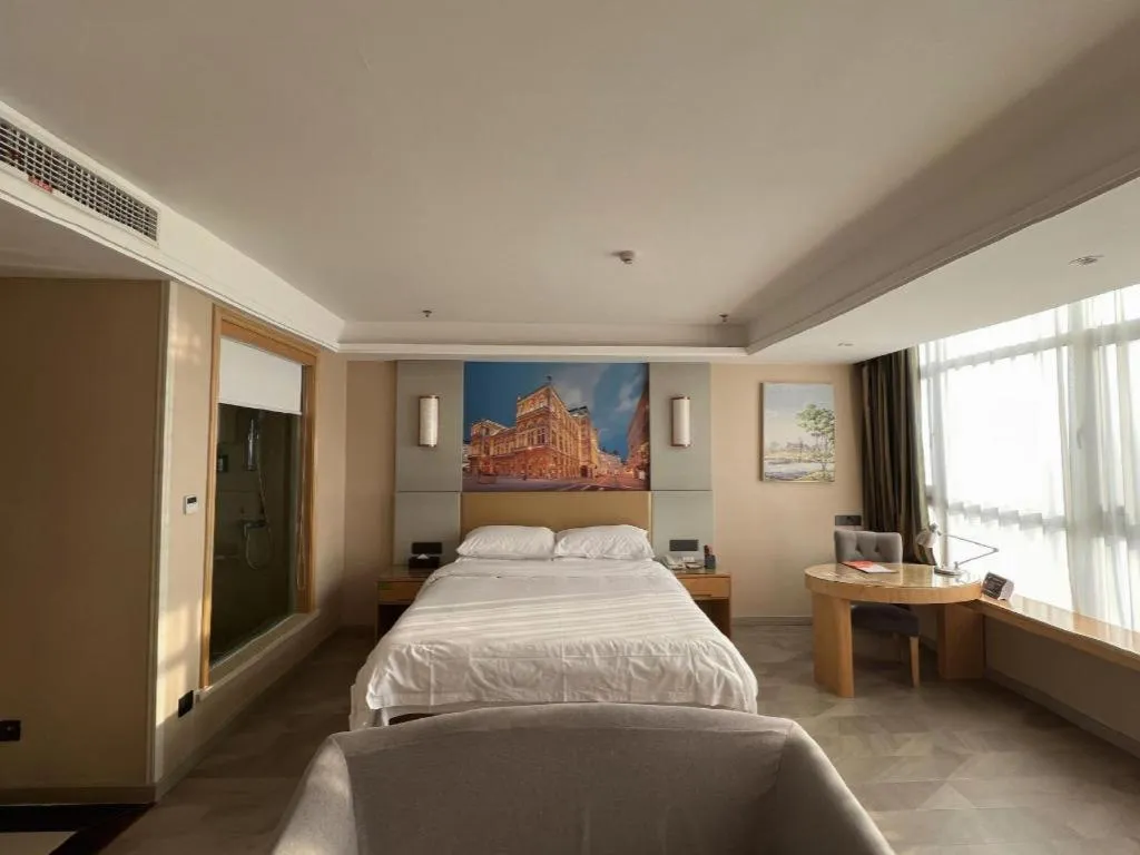 Bed in Vienna Hotel Shandong Qingzhou Ancient City