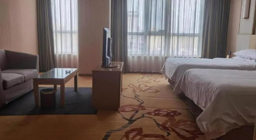 Bed in Vienna Hotel Shandong Qingzhou Ancient City