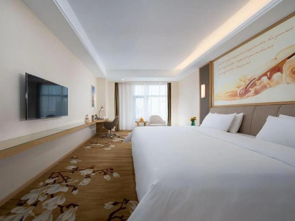 Bed in Vienna Hotel Tianjin Binhai International Airport Free Trade Zone