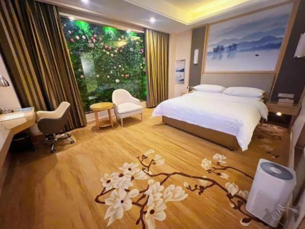 Bed in Vienna Hotel Tianjin Binhai International Airport Free Trade Zone