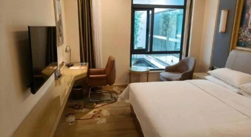 Bed in Vienna Hotel Tianjin Binhai International Airport Free Trade Zone