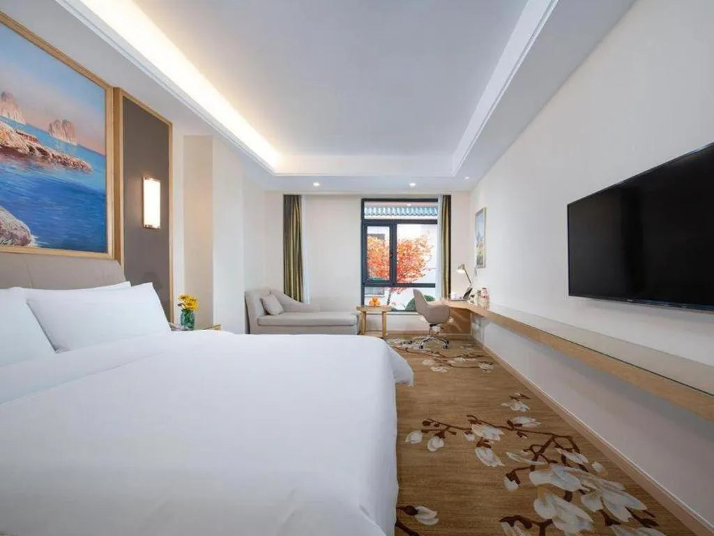 Bed in Vienna Hotel Tianjin Binhai International Airport Free Trade Zone