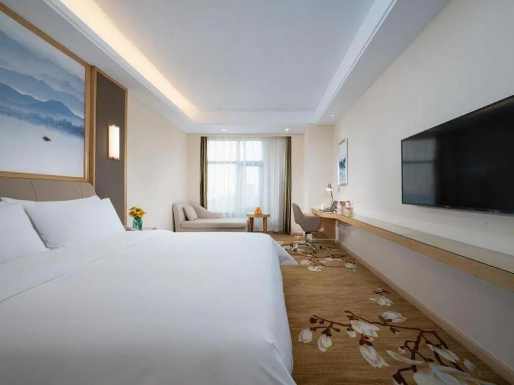 Bed in Vienna Hotel Tianjin Binhai International Airport Free Trade Zone