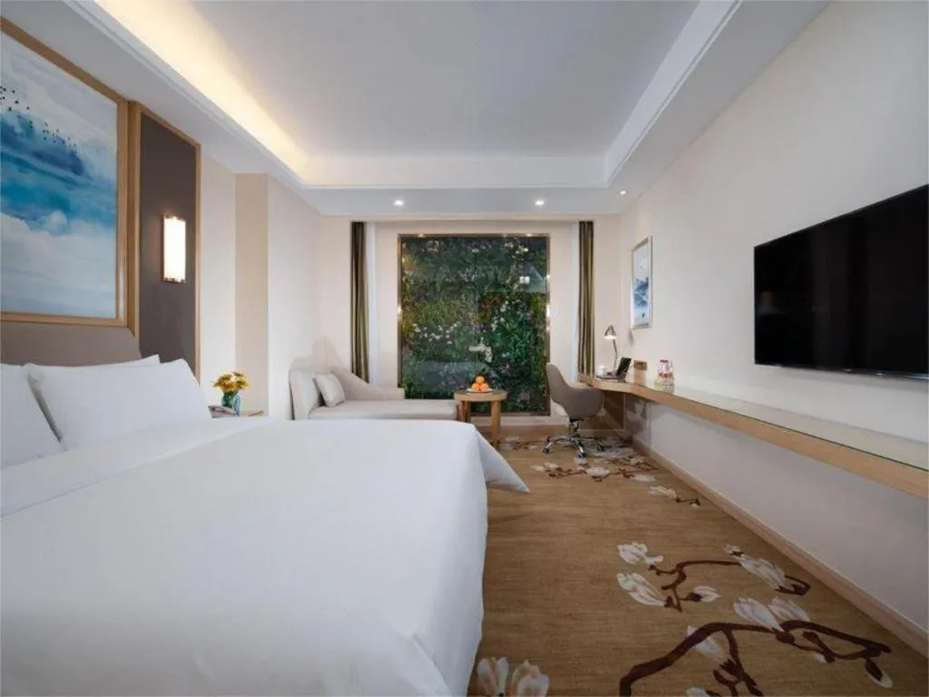 Bed in Vienna Hotel Tianjin Binhai International Airport Free Trade Zone
