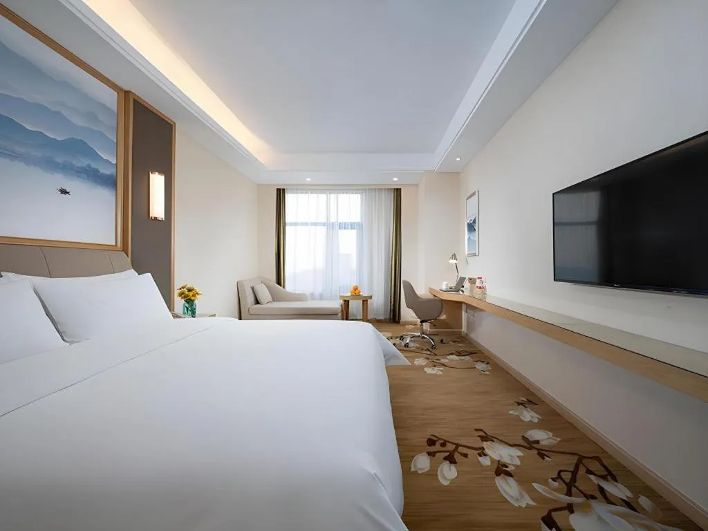 Bed in Vienna Hotel Tianjin Binhai International Airport Free Trade Zone