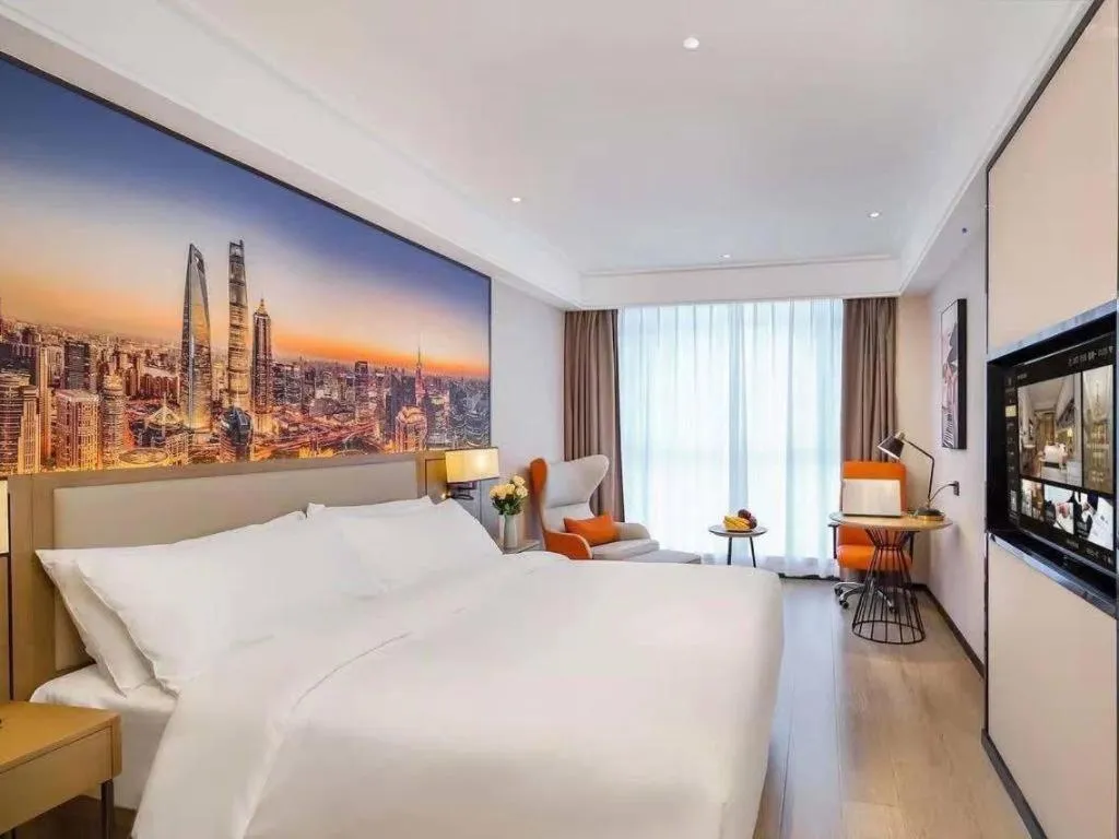 Bed in Vienna Hotel Tianjin Jinzhong Street