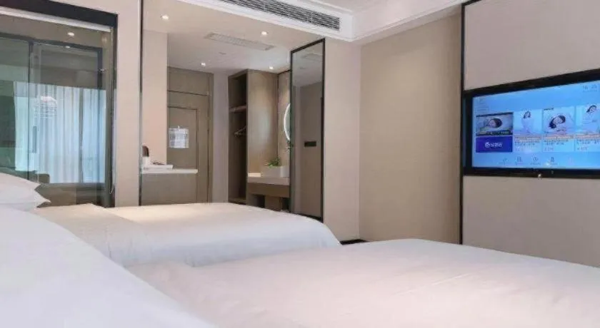 Bed in Vienna Hotel Tianjin Jinzhong Street