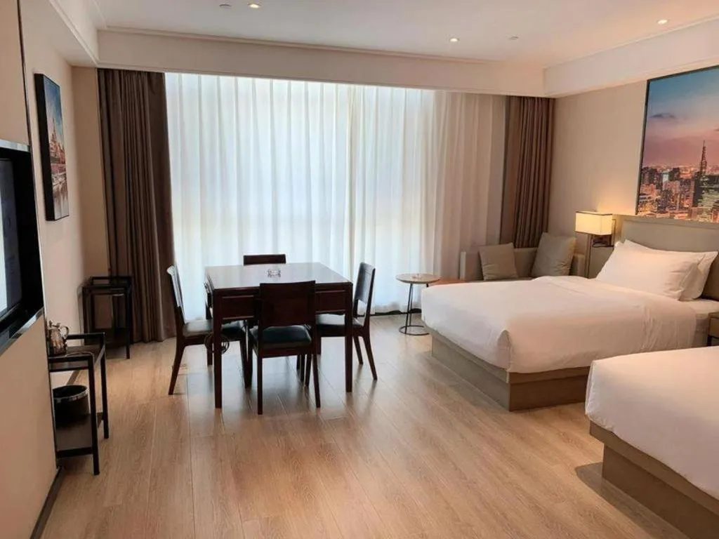 Bed in Vienna Hotel Tianjin Jinzhong Street