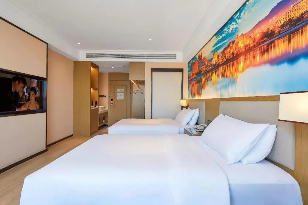 Bed in Vienna Hotel Tianjin Jinzhong Street