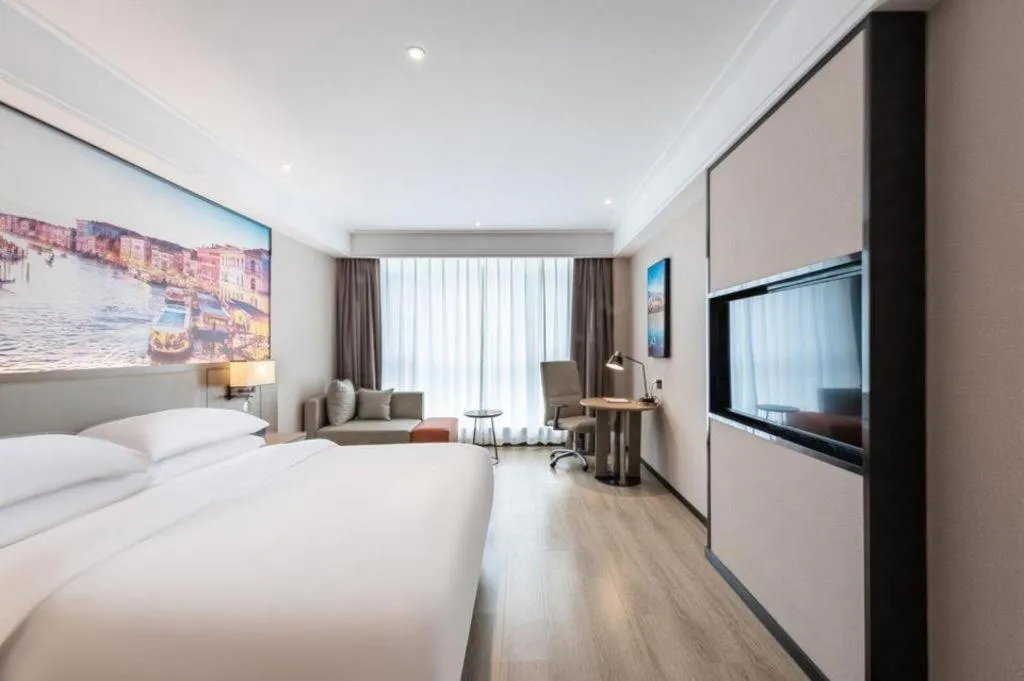 Bed in Vienna Hotel Tianjin Jinzhong Street