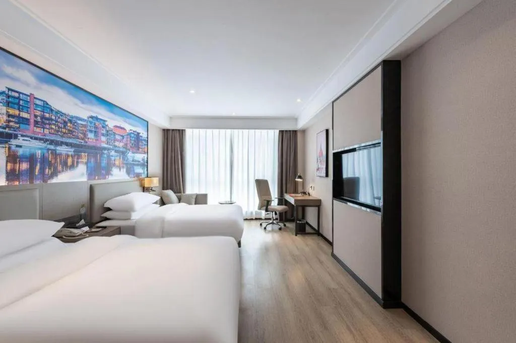 Bed in Vienna Hotel Tianjin Jinzhong Street