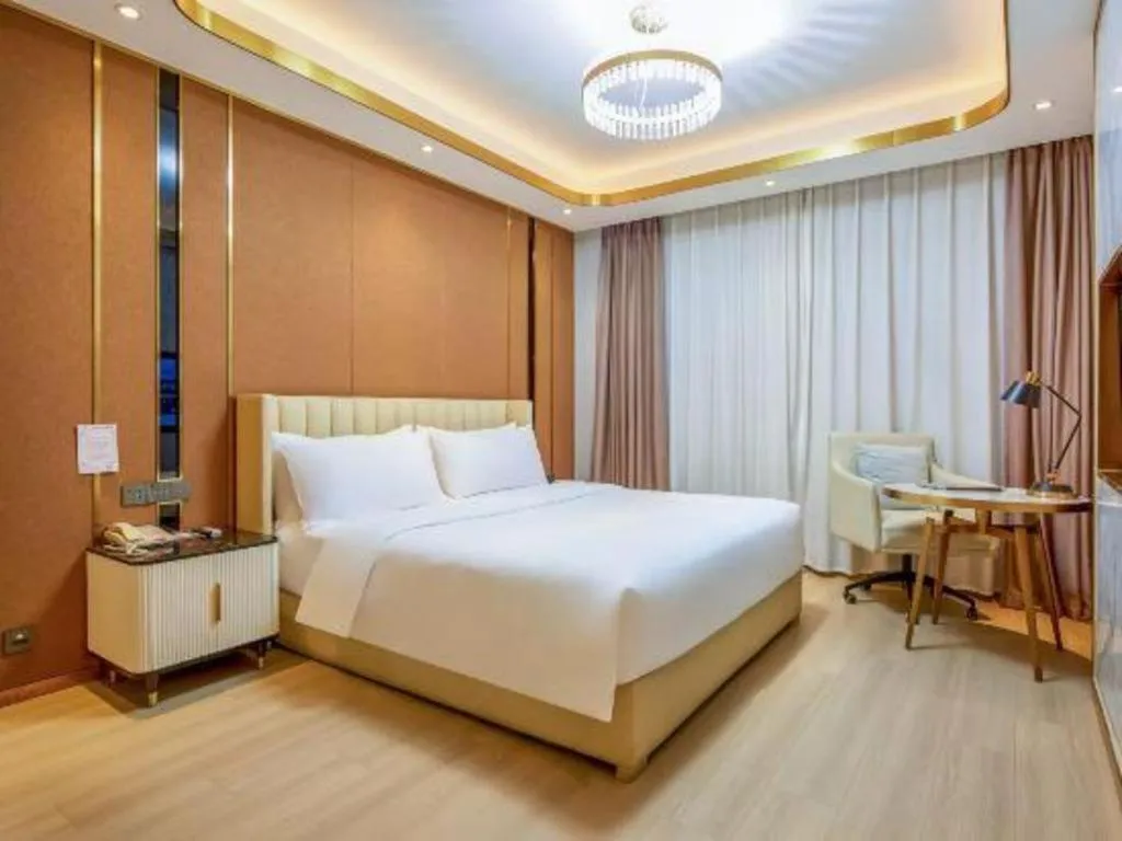 Bed in Vienna Hotel Tianjin Jinzhong Street