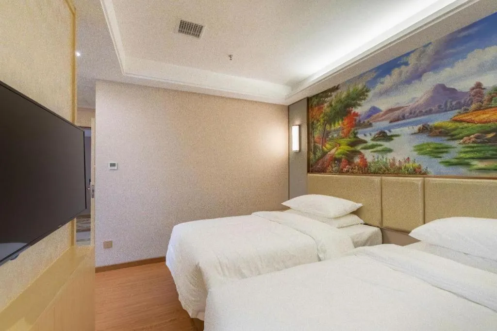 Bed in Vienna Hotel Nanchang Wanli