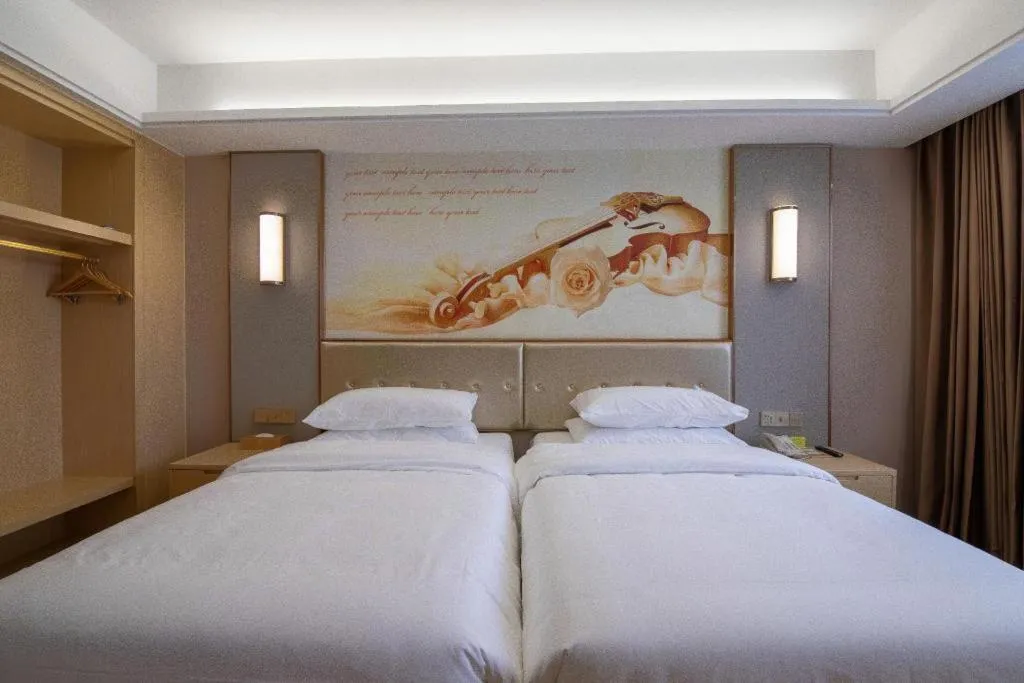 Bed in Vienna Hotel Nanchang Wanli