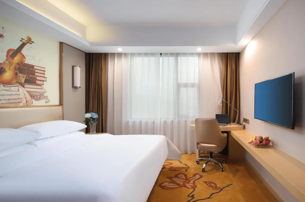 Bed in Vienna Hotel Nanchang Wanli
