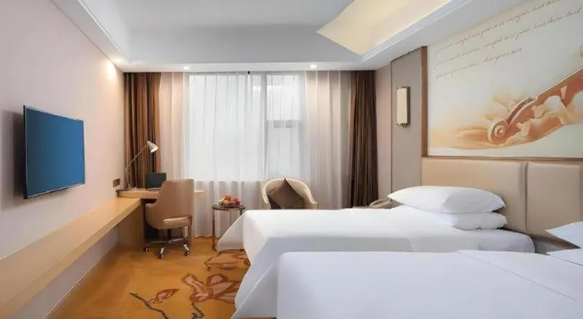 Bed in Vienna Hotel Nanchang Wanli