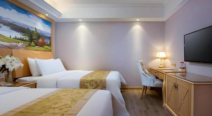 Bed in Vienna Hotel Hangzhou West Lake Qingchun Road