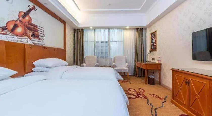 Bed in Vienna Hotel Hunan Shaoyang South Railway Station