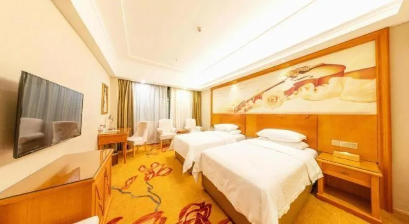 Bed in Vienna Hotel Hunan Shaoyang South Railway Station