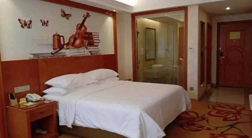 Bed in Vienna Hotel Hunan Shaoyang South Railway Station