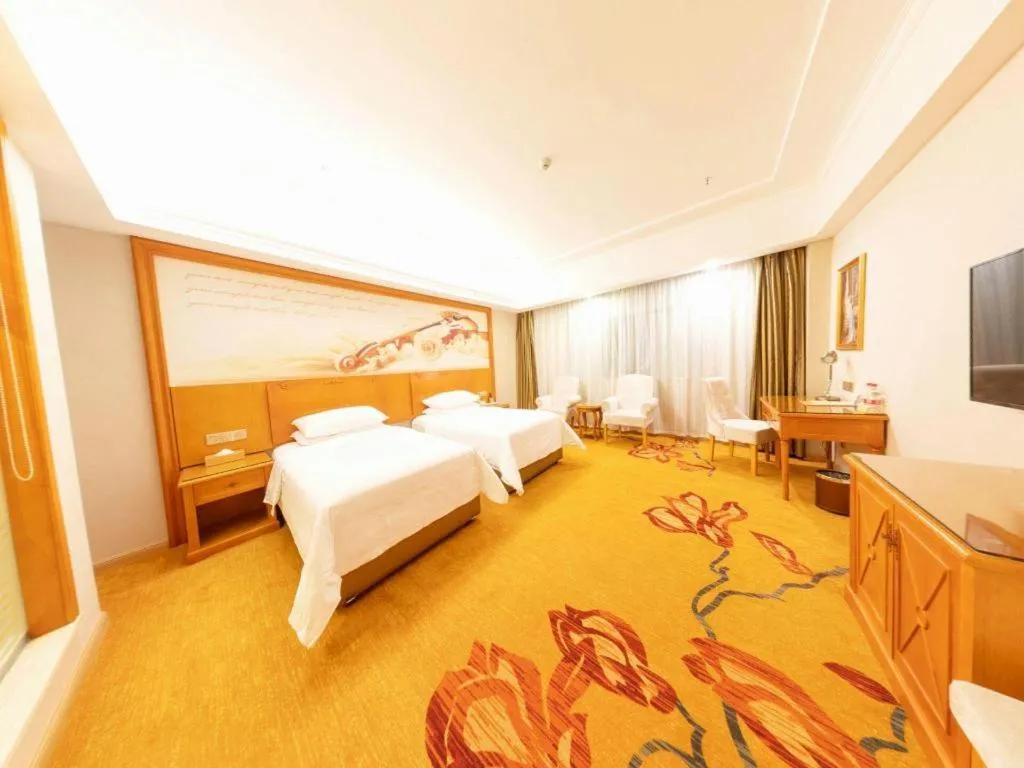 Bed in Vienna Hotel Hunan Shaoyang South Railway Station