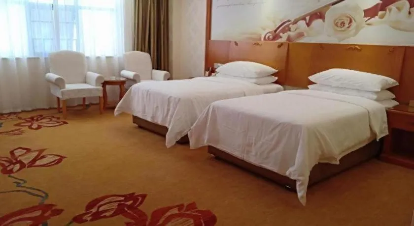 Bed in Vienna Hotel Hunan Shaoyang South Railway Station