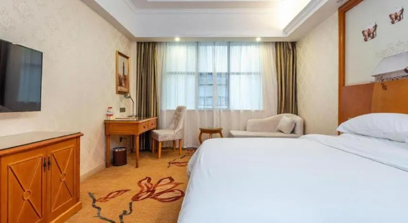 Bed in Vienna Hotel Hunan Shaoyang South Railway Station