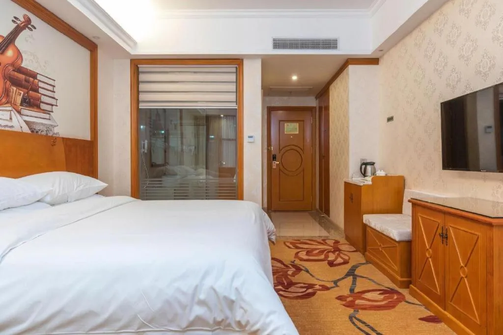 Bed in Vienna Hotel Hunan Shaoyang South Railway Station