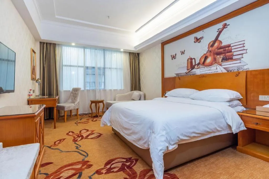 Bed in Vienna Hotel Hunan Shaoyang South Railway Station