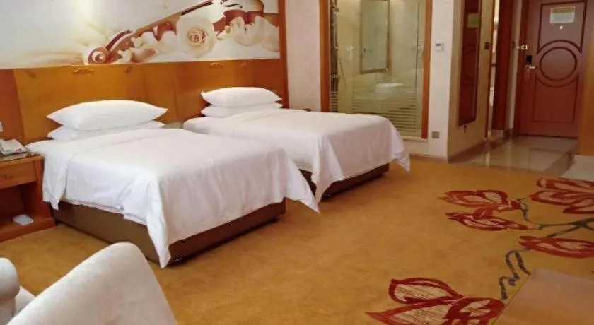 Bed in Vienna Hotel Hunan Shaoyang South Railway Station